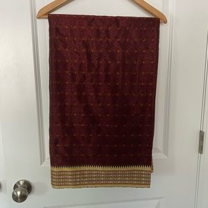 Rich burgundy saree with beautiful gold threadwork